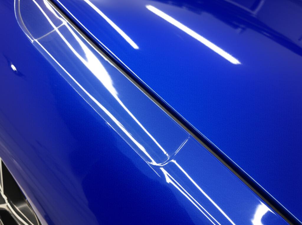 Close up of car paint protected by TPU film